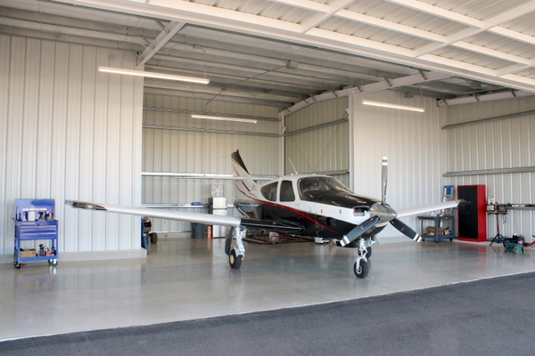 06 Page South Quad Plane In Hangar 3448
